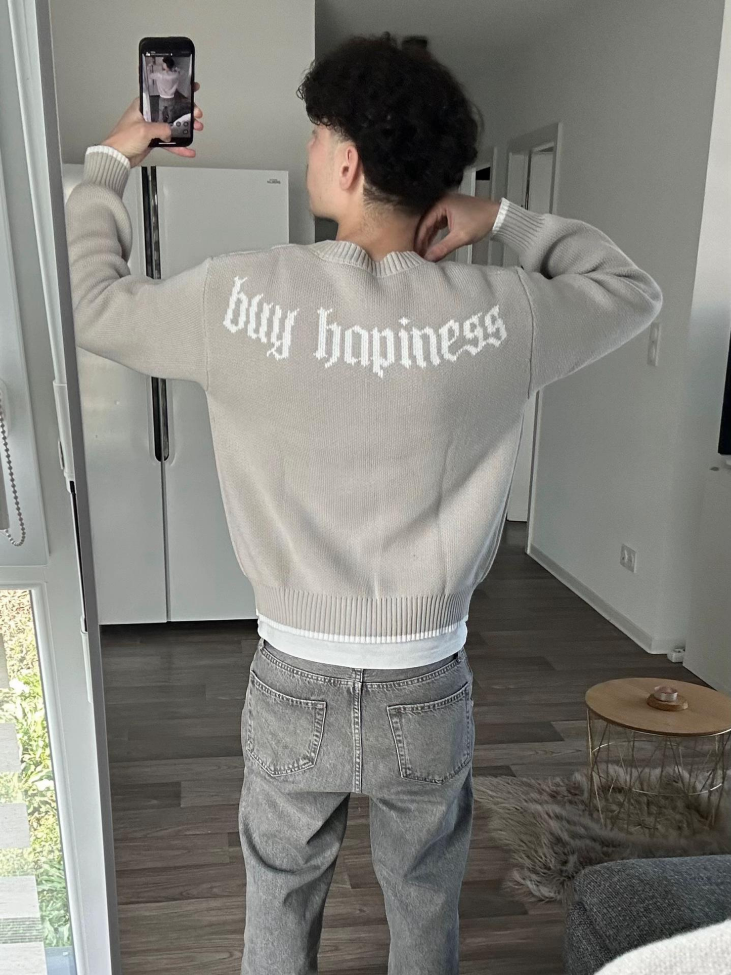 "BUY HAPPINESS" KNIT SWEATER